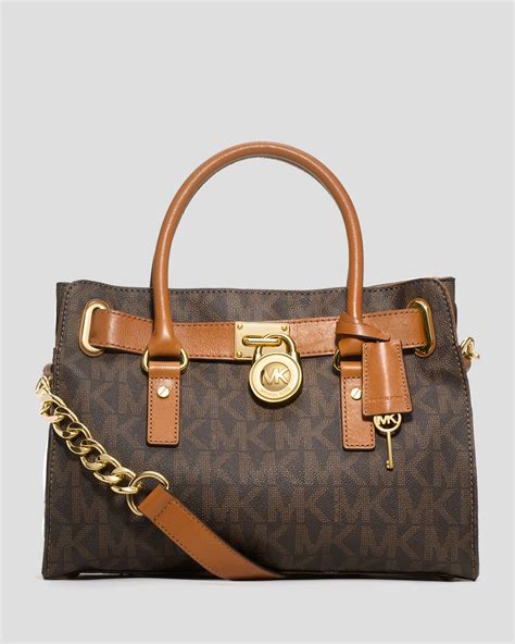 michael kors hamilton east west brown logo satchel handbag|Michael Kors Hamilton legacy bag.